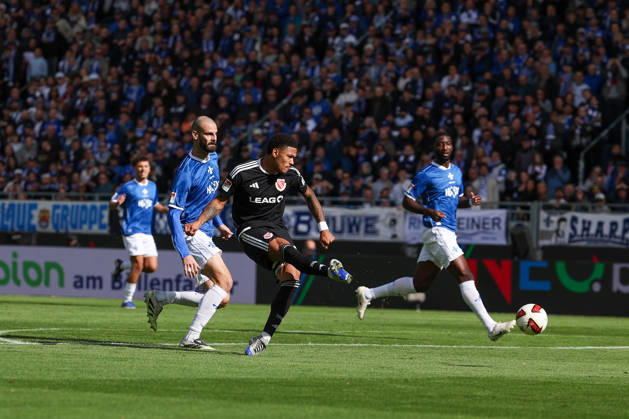 2026.10.10 Fussball 2.Bundesliga SV Darmstadt 98 - Energie Cottbus v.l., Aleksander Vukovic (SV Darmstadt 98), Justin Butler (Energie Cottbus) scores the goal to 0:1 Copyright: HMBxMedia JoaquimxFerreira