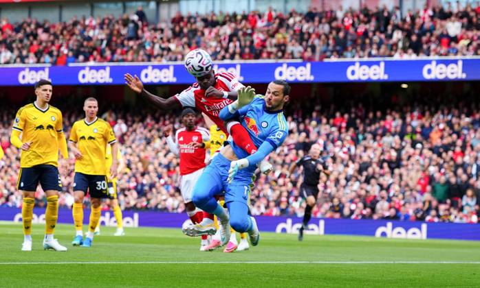 Leeds United goalkeeper James Trafford denies Bukayo Saka of Arsenal Arsenal v Leeds United, Premier League, Football, Emirates Stadium, London, UK - 10 Oct 2026London Emirates Stadium United Kingdom EDITORIAL USE ONLY No use with unauthorised audio, video, data, fixture lists, club league logos or live services. Online in-match use limited to 120 images, no video emulation. No use in betting, games or single club league player publications. Copyright: xJavierxGarcia Shutterstockx 17204400l