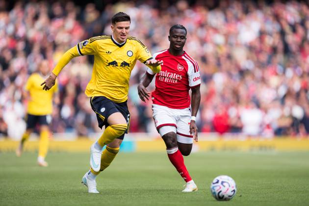 Bukayo Saka of Arsenal and Tarik Muharemovic of Leeds United battle for possession Arsenal v Leeds United, Premier League, Football, Emirates Stadium, London, UK - 10 Oct 2026London Emirates Stadium United Kingdom EDITORIAL USE ONLY No use with unauthorised audio, video, data, fixture lists, club league logos or live services. Online in-match use limited to 120 images, no video emulation. No use in betting, games or single club league player publications. Copyright: xWiredxPhotos Shutterstockx 17204325v