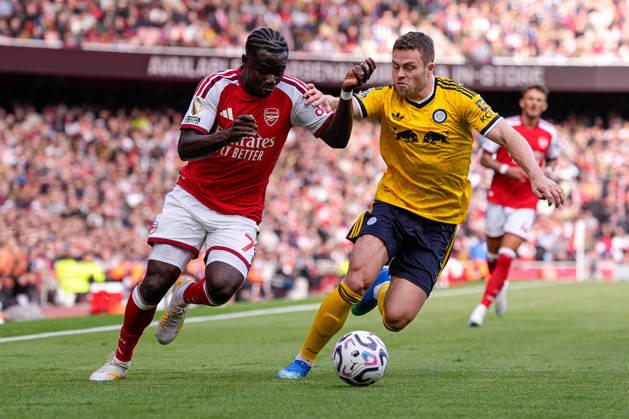 10th October 2026; Emirates Stadium, London, England; Premier League Football, Arsenal versus Leeds United; Bukayo Saka of Arsenal under pressure from Gabriel Gudmundsson of Leeds United TomxMajor
