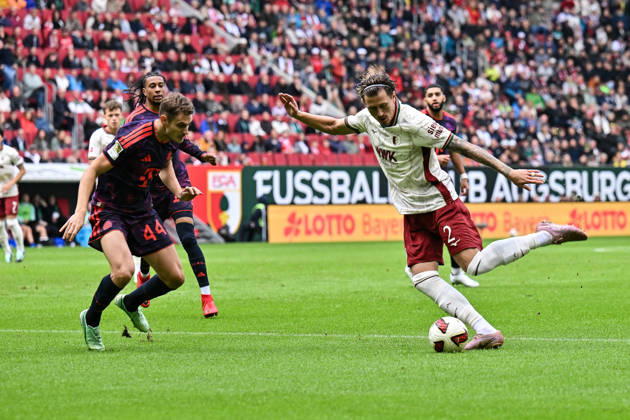 AUGSBURG, GERMANY; 10. OCTOBER: tackle between Josip STANISIC (FC Bayern Munich 44) and Calvin BRACKELMANN (FC Augsburg 2) during the Bundesliga Match between FC Augsburg vs. FC Bayern Munich at Matchday 5 at WWK-Arena DFL REGULATIONS PROHIBIT ANY USE OF PHOTOGRAPHS AS IMAGE SEQUENCES AND OR QUASI-VIDEO Copyright: xBEAUTIFULxSPORTS Goldbergx