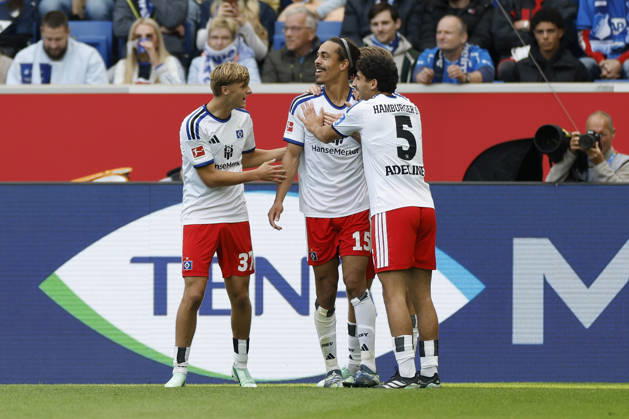 v.l.n.r.: Louis Lemke (HSV), Torschuetze, Scorer Yussuf Poulsen (HSV) und Martin Adeline (HSV), Jubel nach dem Tor zum 0:1, jubelnd, bejubelt, jubelt, jubeln, Cheers after the goal, cheering, celebrated, cheers, cheering, emotions im Bundesliga-Spiel zwischen der TSG 1899 Hoffenheim und dem Hamburger SV in der PreZero Arena, Sinsheim, Deutschland, am 10. Oktober 2026. in action during the Bundesliga match between TSG 1899 Hoffenheim and Hamburger SV at the PreZero Arena, Sinsheim, Germany, on October 10, 2026. DFB DFL REGULATIONS PROHIBIT ANY USE OF PHOTOGRAPHS AS IMAGE SEQUENCES AND OR QUASI-VIDEO, Copyright: HMBxMedia xHeikoxBecker