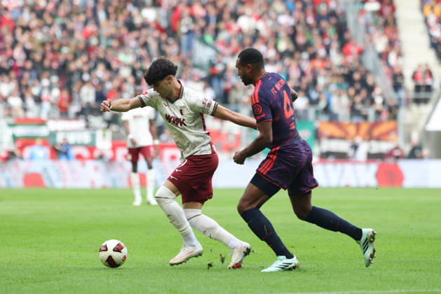 Rodrigo Ribeiro (FC Augsburg, 09) mit Jonathan Tah (FC Bayern Muenchen, 04), GER, FC Augsburg vs. FC Bayern Muenchen, Fussball, Bundesliga, 5. Spieltag, Saison 2026 2027, 10.10.2026, DFL DFB REGULATIONS PROHIBIT ANY USE OF PHOTOGRAPHS as IMAGE SEQUENCES and or QUASI-VIDEO, GER, FC Augsburg vs. FC Bayern Muenchen, Fussball, Bundesliga, 5. Spieltag, Saison 2026 2027, 10.10.2026 Augsburg Copyright: xEibner-Pressefoto JennixMaulx EP_JML