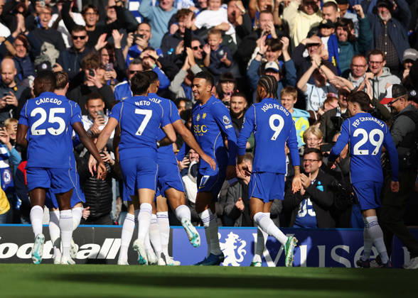 10th October 2026; Stamford Bridge, London, England; Premier League Football, Chelsea versus Bournemouth; Morgan Rogers of Chelsea celebrates with his team after scoring his sides 2nd goal in the 3rd minute to make it 2-0 JohnxPatrickxFletcher