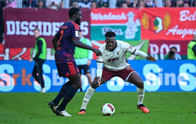 10.10.2026, xemx, Fussball 1.Bundesliga, FC Augsburg - Bayern München v.l. Dayot Upamecano (FC Bayern Muenchen), Juma Bah (FC Augsburg) Zweikampf, Aktion, action, battle for the ball (DFL DFB REGULATIONS PROHIBIT ANY USE OF PHOTOGRAPHS as IMAGE SEQUENCES and or QUASI-VIDEO) Augsburg