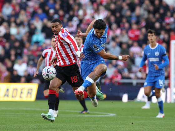 Sunderland, England, 10th October 2026. Wilson Isidor (L) of Sunderland in action with Pascal Gross of Brighton and Hove Albion during the Sunderland vs Brighton and Hove Albion Premier League match at the Stadium Of Light, Sunderland. Picture credit should read: Nigel Roddis Sportimage EDITORIAL USE ONLY. No use with unauthorised audio, video, data, fixture lists, club league logos or live services. Online in-match use limited to 120 images, no video emulation. No use in betting, games or single club league player publications. SPI_008_NR_SUND_BRIG SPI-5059-0008