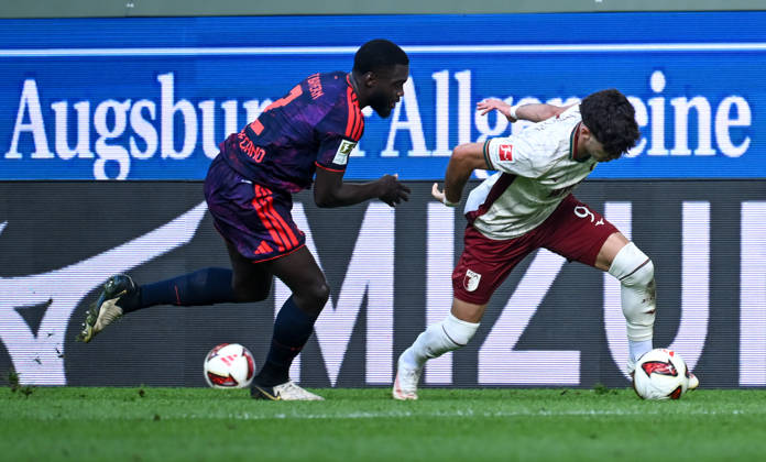10.10.2026, xemx, Fussball 1.Bundesliga, FC Augsburg - Bayern München v.l. Dayot Upamecano (FC Bayern Muenchen), Rodrigo Ribeiro (FC Augsburg) Zweikampf, Aktion, action, battle for the ball (DFL DFB REGULATIONS PROHIBIT ANY USE OF PHOTOGRAPHS as IMAGE SEQUENCES and or QUASI-VIDEO) Augsburg
