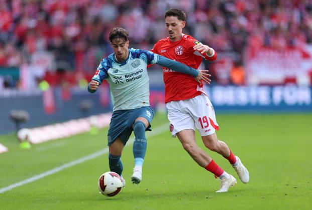 10.10.2026, Fussball Bundesliga, 1. FSV Mainz 05 - Bayer 04 Leverkusen, v.l., Afonso Moreira (Bayer 04 Leverkusen), Anthony Caci (FSV Mainz 05) DFL DFB REGULATIONS PROHIBIT ANY USE OF PHOTOGRAPHS AS IMAGE SEQUENCES AND OR QUASI-VIDEO. xdcx Copyright: HMBxMedia Claus