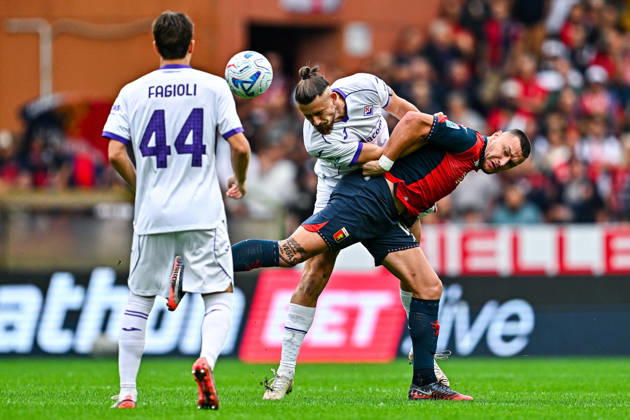 October 10, 2026, Genoa, ITALY: Fiorentina s Romanian defender Radu Dragusin (centre) and Genoa™s Montenegrin forward Milutin Osmajic in action during the Italian Serie A soccer match Genoa Cfc vs Acf Fiorentina at Luigi Ferraris stadium in Genoa, Italy, 10 October 2026. ANSA STRINGER. Serie A - Genoa Cfc Vs Acf Fiorentina  - ZUMAa110 20261010_zaf_a110_015 Copyright: xStringerx