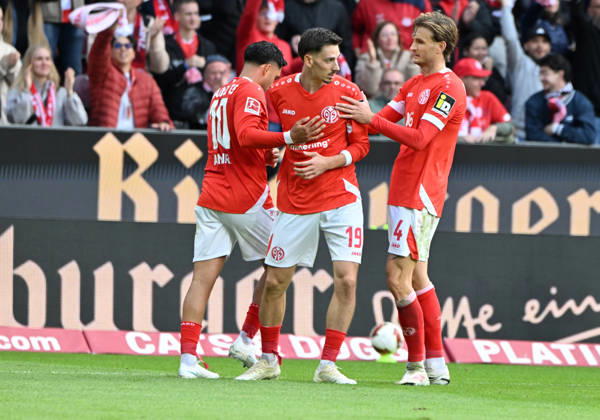 Fussball-Bundesliga - Saison 2026 2027 Mewa-Arena Mainz - 10.10.2026 1. FSV Mainz 05 (mz) - Bayer Leverkusen (lev) Jubel nach dem 2:2: v.li: Nadiem AMIRI(1. FSV Mainz 05) , Doppeltorschütze Anthony CACI (1. FSV Mainz 05) und Stefan POSCH (1. FSV Mainz 05) DFL REGULATIONS PROHIBIT ANY USE OF PHOTOGRAPHS AS IMAGE SEQUENCES AND OR QUASI VIDEO EDITORIAL USE ONLY NATIONAL AND INTERNATIONAL NEWS AGENCIES OUT Fussball-Bundesliga - 1. FSV Mainz 05