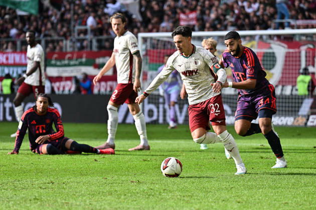 AUGSBURG, GERMANY; 10. OCTOBER: tackle between Fabian RIEDER (FC Augsburg 32) and Ismael SAIBARI (FC Bayern Munich 34) during the Bundesliga Match between FC Augsburg vs. FC Bayern Munich at Matchday 5 at WWK-Arena DFL REGULATIONS PROHIBIT ANY USE OF PHOTOGRAPHS AS IMAGE SEQUENCES AND OR QUASI-VIDEO Copyright: xBEAUTIFULxSPORTS Goldbergx