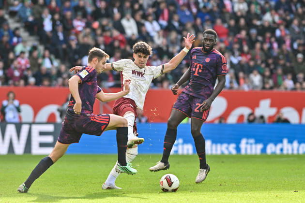 AUGSBURG, GERMANY; 10. OCTOBER: tackle between Josip STANISIC (FC Bayern Munich 44) and Rodrigo Duarte RIBEIRO (FC Augsburg 9) during the Bundesliga Match between FC Augsburg vs. FC Bayern Munich at Matchday 5 at WWK-Arena DFL REGULATIONS PROHIBIT ANY USE OF PHOTOGRAPHS AS IMAGE SEQUENCES AND OR QUASI-VIDEO Dayot UPAMECANO (FC Bayern Munich 2) Copyright: xBEAUTIFULxSPORTS Goldbergx