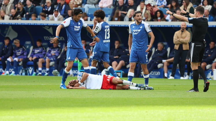 10.10.2026, xrekx, Fussball 1.Bundesliga, TSG 1899 Hoffenheim - Hamburger SV v.l. Yussuf Poulsen (Hamburger SV) verletzt, Verletzung, Schmerz, Schmerzen, injured, injury, pain, pains (DFL DFB REGULATIONS PROHIBIT ANY USE OF PHOTOGRAPHS as IMAGE SEQUENCES and or QUASI-VIDEO) Sinsheim
