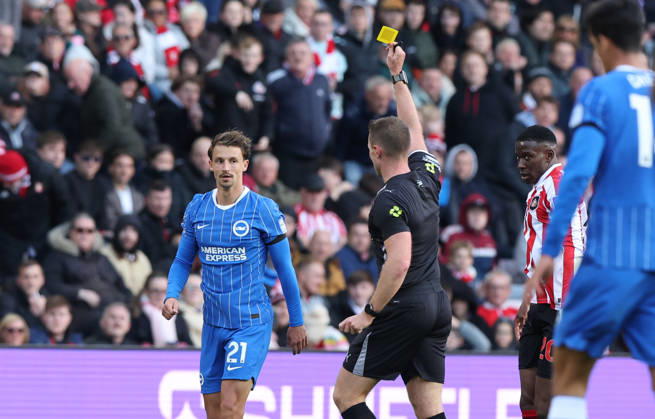 Sunderland, England, 10th October 2026. Yellow card for Olivier Boscagli of Brighton and Hove Albion during the Sunderland vs Brighton and Hove Albion Premier League match at the Stadium Of Light, Sunderland. Picture credit should read: Nigel Roddis Sportimage EDITORIAL USE ONLY. No use with unauthorised audio, video, data, fixture lists, club league logos or live services. Online in-match use limited to 120 images, no video emulation. No use in betting, games or single club league player publications. SPI_013_NR_SUND_BRIG SPI-5059-0013