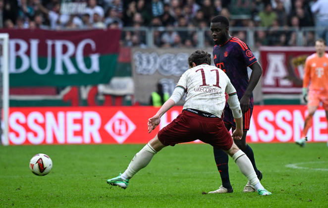 10.10.2026, xemx, Fussball 1.Bundesliga, FC Augsburg - Bayern München v.l. Michael Gregoritsch (FC Augsburg), Dayot Upamecano (FC Bayern Muenchen) Zweikampf, Aktion, action, battle for the ball (DFL DFB REGULATIONS PROHIBIT ANY USE OF PHOTOGRAPHS as IMAGE SEQUENCES and or QUASI-VIDEO) Augsburg