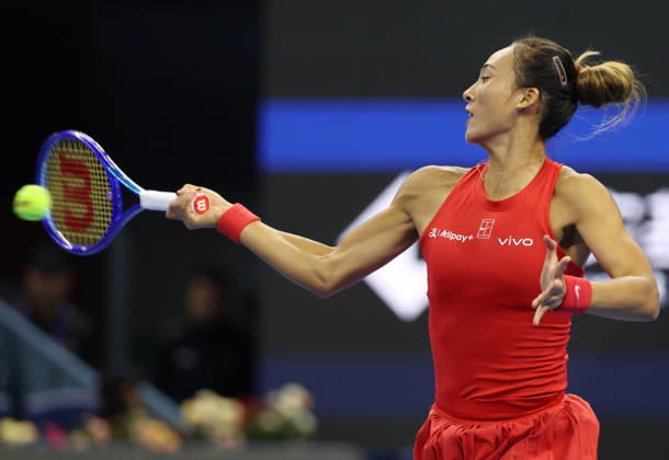 (261010) -- BEIJING, Oct. 10, 2026 -- Zheng Qinwen hits a return during the women s singles semifinal between Zheng Qinwen of China and Elise Mertens of Belgium at 2026 China Open tennis tournament in Beijing, China, Oct. 10, 2026. ) (SP)CHINA-BEIJING-TENNIS-CHINA OPEN-WOMEN S SINGLES-SEMIFINAL (CN) ZhangxChenlin 