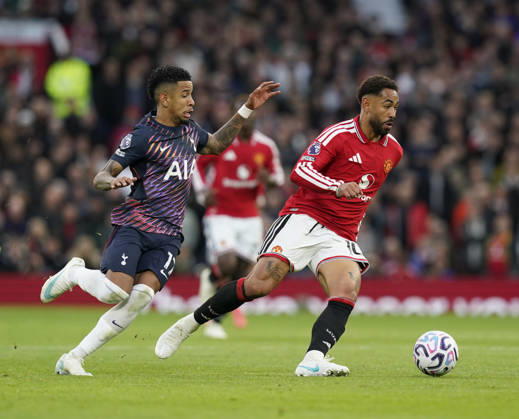 Manchester, England, 10th October 2026. Savio of Tottenham and Matheus Cunha of Manchester United, ManU during the Manchester United vs Tottenham Hotspur Premier League match at Old Trafford, Manchester. Picture credit should read: Andrew Yates Sportimage EDITORIAL USE ONLY. No use with unauthorised audio, video, data, fixture lists, club league logos or live services. Online in-match use limited to 120 images, no video emulation. No use in betting, games or single club league player publications. SPI_034_AY_MANUTD_SPURS SPI-5058-0033