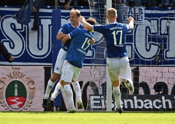 10.10.2026, xjhx, Fussball 2.Bundesliga, SV Darmstadt 98 - Energie Cottbus v.l. Yannik Lührs (SV Darmstadt 98), Fynn Lakenmacher (SV Darmstadt 98), Kai Klefisch (SV Darmstadt 98) celebrate the goal, Der Torjubel zum 3:1 (DFL DFB REGULATIONS PROHIBIT ANY USE OF PHOTOGRAPHS as IMAGE SEQUENCES and or QUASI-VIDEO) Darmstadt