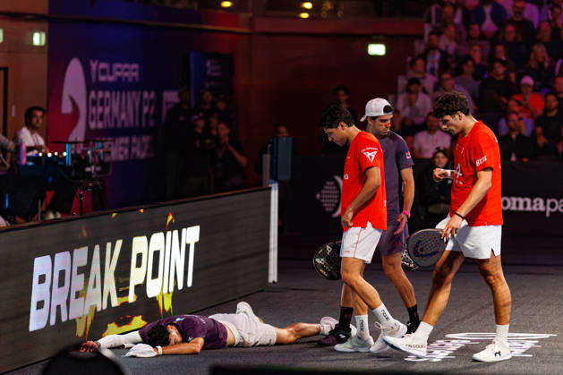 DÜSSELDORF, GERMANY - 10 OCTOBER 2026: Image shows Leandro Roman Augsburger (ARG) on the floor with Juan Lebron (ESP), Agustin Tapia (ARG) and Arturo Coello (ESP) during CUPRA Germany Premier Padel P2 2026 Day 7: Semifinals at CASTELLO Düsseldorf on 10 10 2026 in Düsseldorf, Germany. Germany Copyright: xFröhlichxPascalx