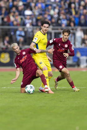 3. Liga, Fortuna Köln - 1. FC Saarbrücken; 10.10.2026 Tom Geerkens (Fortuna Köln, 6), Kaan Caliskaner (1. FC Saarbrücken, 22), David Savic (Fortuna Köln, 23). 3. Liga, Fortuna Köln - 1. FC Saarbrücken, 8. Spieltag, am 10.10.2026, Südstadion, Köln. DFB regulations prohibit any use of photographs as image sequences and or quasi-video Copyright: xBEAUTIFULxSPORTS Meuselx