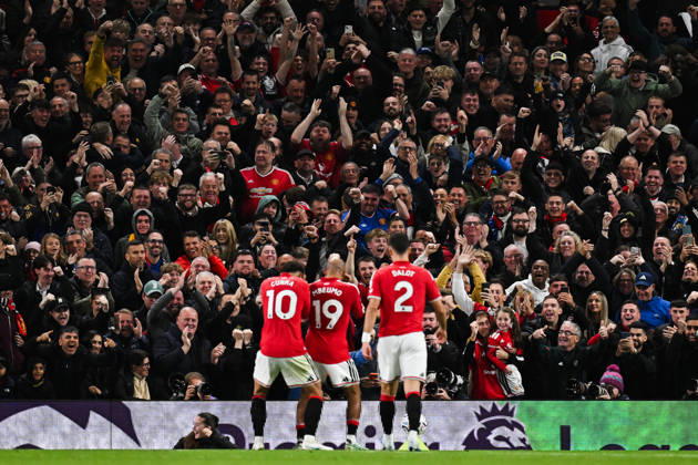 MANCHESTER, ENGLAND, OCT 10: Bryan Mbeumo of Manchester United, ManU celebrates scoring his sides first goal with spectators during the Premier League match between Manchester United and Tottenham Hotspur at Old Trafford in Manchester, England (Will Palmer Sports Press Photo) Copyright: xWillxPalmer SportsxPressxPhotox Sportspressphoto_SPR251405
