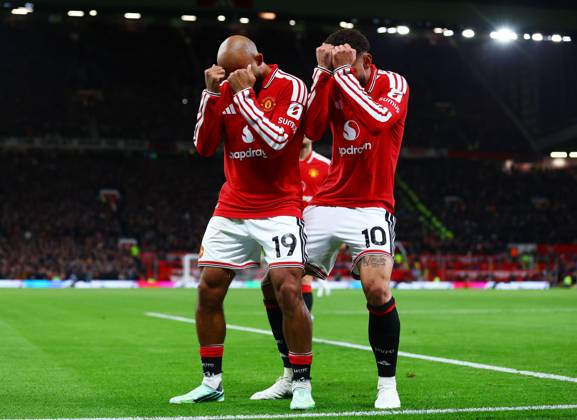 Bryan Mbeumo of Manchester United, ManU celebrates scoring the opening goal with Matheus Cunha Manchester United v Tottenham Hotspur, Premier League, Football, Old Trafford, Manchester, UK - 10 Oct 2026Manchester Old Trafford United Kingdom EDITORIAL USE ONLY No use with unauthorised audio, video, data, fixture lists, club league logos or live services. Online in-match use limited to 120 images, no video emulation. No use in betting, games or single club league player publications. Copyright: xMattxWest Shutterstockx 17208388ac