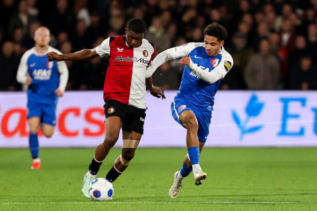 2026-10-10 Feyenoord v AZ Alkmaar - Dutch Eredivisie ROTTERDAM, NETHERLANDS - OCTOBER 10: Givairo Read of Feyenoord is challenged by Ro-Zangelo Daal of AZ Alkmaar during the Dutch Eredivisie match between Feyenoord and AZ Alkmaar at Stadion Feijenoord on October 10, 2026 in Rotterdam, Netherlands. Rotterdam Stadion Feijenoord Netherlands Content not available for redistribution in The Netherlands directly or indirectly through any third parties. Copyright: xHansxvanxderxValkx