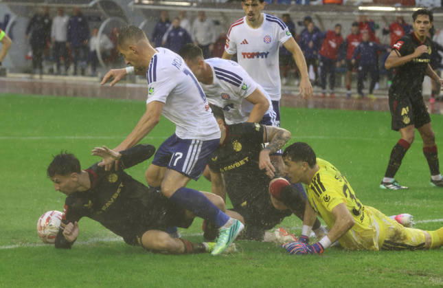 SuperSport HNL, round 09: HNK Hajduk Split v GNK Dinamo Zagreb Iker Almena of GNK Dinamo Zagreb, Dario Melnjak and Toni Silic of HNK Hajduk Split during the SuperSport HNL 2026. 2027. round 09 match between HNK Hajduk Split and GNK Dinamo Zagreb at Poljud Stadium in Split, Croatia on October 10, 2026.  IvoxCagalj PIXSELL