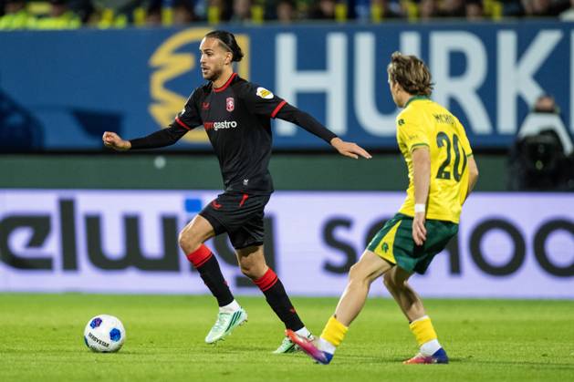 SITTARD , 10-10-2026 , Fortuna Sittard Stadium , season 2025 2026 , Dutch Eredivisie football , match between Fortuna Sittard and FC Twente , picture shows FC Twente player Ramiz Zerrouki Fortuna Sittard player Edouard Michut Fortuna Sittard - Twente  x208125347x Copyright: