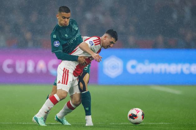AMSTERDAM , 10-10-2026 , JohanCruyff Arena , season 2026 2027 , Dutch Eredivisie football , Match between Ajax and NEC Nijmegen , picture shows NEC Nijmegen player Gabriel Bras challenges Ajax player Oscar Gloukh Ajax - NEC  x208128111x Copyright: