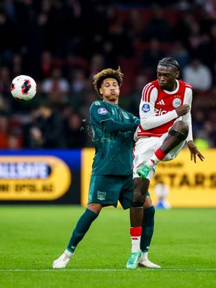AMSTERDAM , 10-10-2026 , JohanCruyff Arena , season 2026 2027 , Dutch Eredivisie football , Match between Ajax and NEC Nijmegen , picture shows NEC Nijmegen player Noe Lebreton challenges Ajax player Jorthy Mokio Ajax - NEC  x208128127x Copyright: