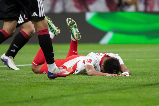 1. Fußball Bundesliga: RB Leipzig - Eintracht Frankfurt; 10.10.2026 Tidiam Gomis (27, RB Leipzig) liegt nach einer vergebenen Chance enttäuscht auf dem Rasen. LEIPZIG, DEUTSCHLAND - OCTOBER 10: Bundesliga-Spiel RB Leipzig - Eintracht Frankfurt in der Red Bull Arena am 5. Spieltag der 1. Bundesliga am October 10, 2026 in Leipzig, Deutschland. DFL REGULATIONS PROHIBIT ANY USE OF PHOTOGRAPHS AS IMAGE SEQUENCES AND OR QUASI-VIDEO. Copyright: xBEAUTIFULxSPORTS JanxKaeferx
