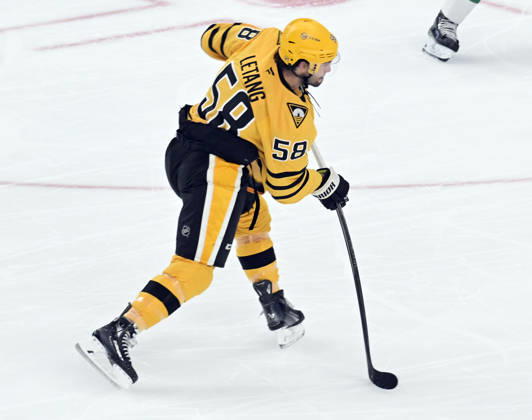 Pittsburgh Penguins defenseman Kris Letang (58) takes a shot on goal against the Dallas Stars during first period at PPG Paints Arena in Pittsburgh on Saturday, October, 10 2026.  PIT2026101004 ARCHIExCARPENTER