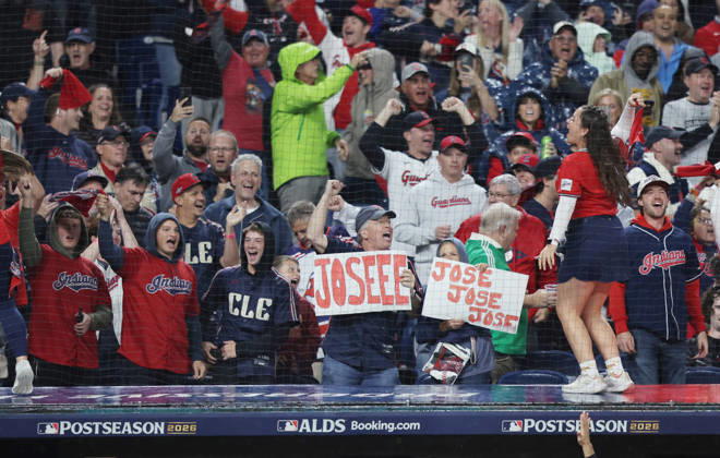 Cleveland Guardians fans celebrate after Jose Ramirez hit a two-run home run against the Chicago White Sox in the fourth inning of an MLB, Baseball Herren, USA American League Division Series at Progressive Field in Cleveland, Ohio, on Saturday, October 10, 2026.  CLE20261010723 AARONxJOSEFCZYK