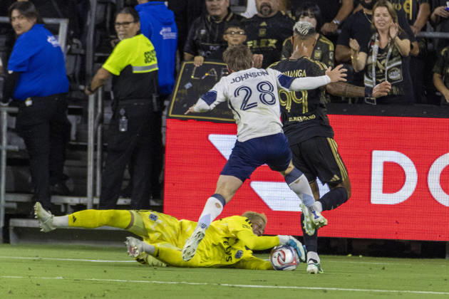 October 10, 2026, Los Angeles, California, USA: Vancouver Whitecaps goalkeeper Yohei Takaoka (1) makes a save against Los Angeles FC striker Denis Bouanga (99) during a MLS, Fussball Herren, USA soccer game on Saturday, Oct. 10, 2026 in Los Angeles. Los Angeles USA - ZUMAc68_ 20261010_zaf_c68_027 Copyright: xRingoxChiux
