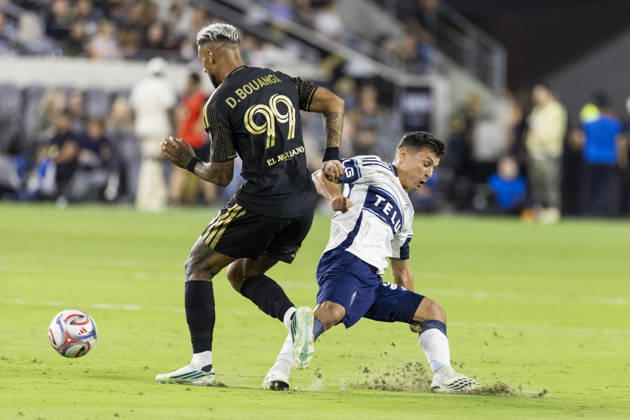 October 10, 2026, Los Angeles, California, USA: Los Angeles FC striker Denis Bouanga (99) and Vancouver Whitecaps defensive midfielder Andres Cubas (20) vie for the ball during a MLS, Fussball Herren, USA soccer game on Saturday, Oct. 10, 2026 in Los Angeles. Los Angeles USA - ZUMAc68_ 20261010_zaf_c68_036 Copyright: xRingoxChiux