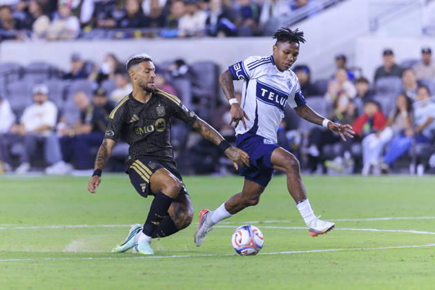 October 10, 2026, Los Angeles, California, USA: Denis Bouanga 99 of the Los Angeles Football Club falls as he and Edier Ocampo 18 of the Vancouver Whitecaps struggle for possession of the ball during their regular season MLS, Fussball Herren, USA game on Saturday October 10, 2026 at the BMO Stadium in Los Angeles, California. ARIANA RUIZ PI Los Angeles USA - ZUMAp124 20261010_zaa_p124_011 Copyright: xArianaxRuizx
