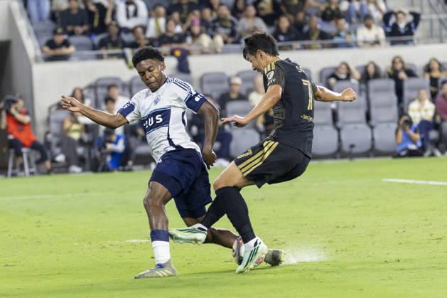 October 10, 2026, Los Angeles, California, USA: Los Angeles FC attacking midfielder Heung Min Son (7) and Vancouver Whitecaps centre back Ralph Priso (6) vie for the ball during a MLS, Fussball Herren, USA soccer game on Saturday, Oct. 10, 2026 in Los Angeles. Los Angeles USA - ZUMAc68_ 20261010_zaf_c68_046 Copyright: xRingoxChiux