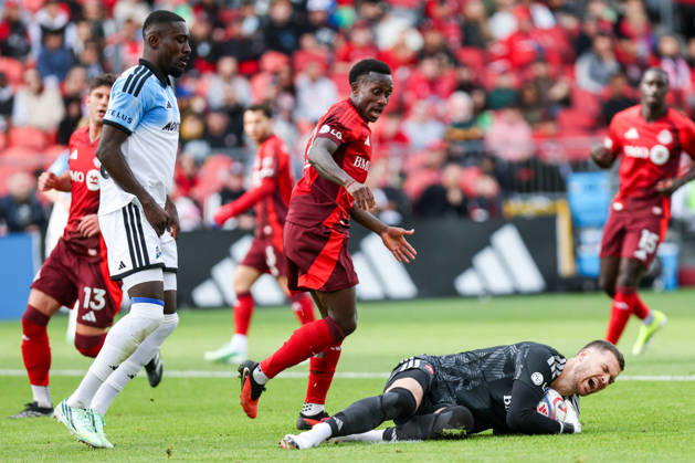 Toronto FC v CF Montreal Luka Gavran 1 of Toronto FC reacts in pain after collecting the ball from Prince Owusu 9 of CF Montreal, with Richie Laryea 22 of Toronto FC nearby, during a Major League Soccer match between Toronto FC and CF Montreal at BMO Field in Toronto, Ontario, Canada, on October 10, 2026. Toronto Ontario Canada  Copyright: xIndrawanxKumalax originalFilename:kumala-majorlea261010_npZEf.jpg