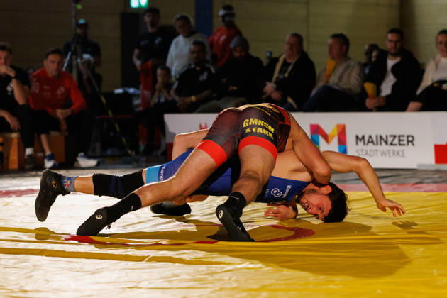 DRB BIRTAT Bundesliga, 6. Wettkampftag, ASV Mainz 88 - KG Baienfurt Ravensburg, Mainz, 10.10.2026 Kampf zwischen John Keterling (rot, ASV Mainz 88) Norik Harutyunyan (blau, KG Baienfurt Ravensburg), Freistil bis 61 kg DRB BIRTAT Bundesliga, 6. Wettkampftag, ASV Mainz 88 - KG Baienfurt Ravensburg, Sporthalle am großen Sand, Mainz, 10.10.2026 Copyright: xBEAUTIFULxSPORTS Hahnex