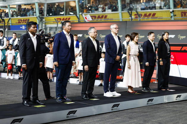 F1 - SINGAPORE GRAND PRIX 2026 DOMENICALI Stefano (ita), Chairman and CEO Formula One Group FOG, portrait, FIA representatives on the grid during the 2026 Formula 1 Singapore Grand Prix, 17th round of the 2026 Formula One World Championship, WM, Weltmeisterschaft from October 9 to 11, 2026 on the Marina Bay Street Circuit, in Singapore, Singapore - SingaporeSingapore  Copyright: xDPPIx