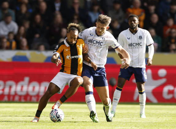 Kingston upon Hull, England, 11th October 2026. James Tarkowski of Everton(r) tussles with Liam Millar of Hull City (l) during the Hull City vs Everton Premier League match at the MKM Stadium, Kingston upon Hull. Picture credit should read: Cody Froggatt Sportimage EDITORIAL USE ONLY. No use with unauthorised audio, video, data, fixture lists, club league logos or live services. Online in-match use limited to 120 images, no video emulation. No use in betting, games or single club league player publications. SPI_025_CF_HULL_CITY_EVERTON SPI-5062-0026