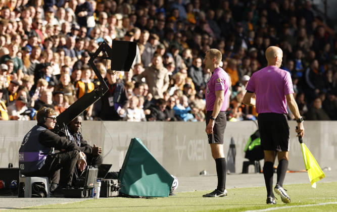Kingston upon Hull, England, 11th October 2026. Referee Michale Salisbury views the VAR video replay before disallowing the Everton goal during the Hull City vs Everton Premier League match at the MKM Stadium, Kingston upon Hull. Picture credit should read: Cody Froggatt Sportimage EDITORIAL USE ONLY. No use with unauthorised audio, video, data, fixture lists, club league logos or live services. Online in-match use limited to 120 images, no video emulation. No use in betting, games or single club league player publications. SPI_026_CF_HULL_CITY_EVERTON SPI-5062-0028