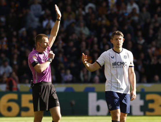 Kingston upon Hull, England, 11th October 2026. Referee Michael Salisbury announce the Everton goal was offside as James Tarkowski of Everton complains during the Hull City vs Everton Premier League match at the MKM Stadium, Kingston upon Hull. Picture credit should read: Cody Froggatt Sportimage EDITORIAL USE ONLY. No use with unauthorised audio, video, data, fixture lists, club league logos or live services. Online in-match use limited to 120 images, no video emulation. No use in betting, games or single club league player publications. SPI_027_CF_HULL_CITY_EVERTON SPI-5062-0027