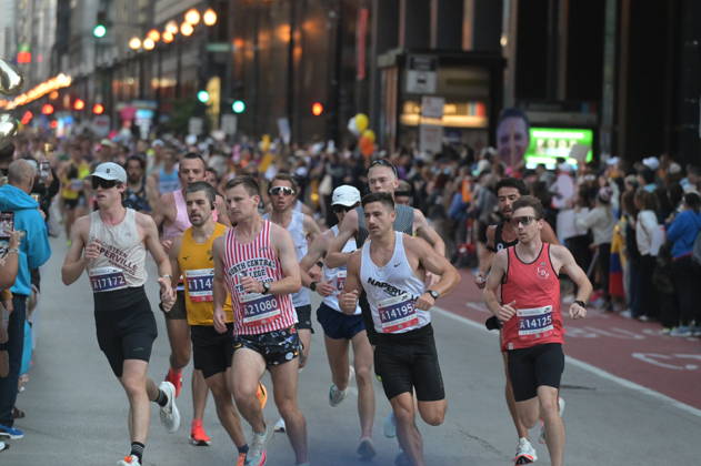 Chicago Marathon 2026 CHICAGO, ILLINOIS - OCTOBER 11: A pack of runners competes during the 48th Bank of America Chicago Marathon on Dearborn Street in the Loop, near the Alexander Calder s Flamingo sculpture at Federal Plaza on October 11, 2026 in Chicago, Illinois. The 26.2-mile race started and finished in Grant Park, winding through 29 neighborhoods with over 55,000 participants. Jacek Boczarski Anadolu Chicago United States. Editorial use only. Please get in touch for any other usage.  Copyright: x2026xAnadoluxJacekxBoczarskix