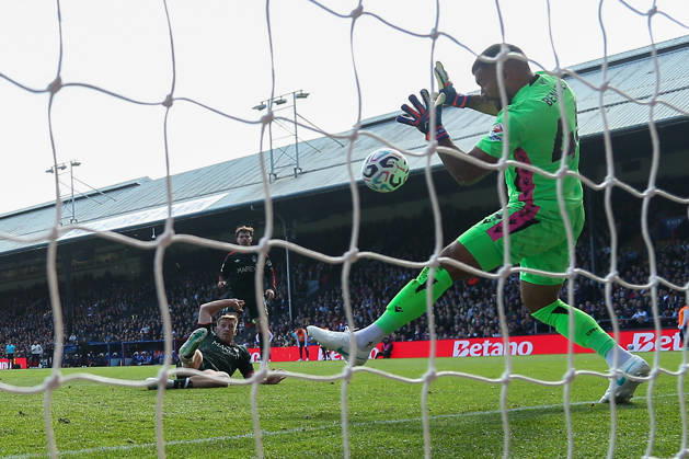 11th October 2026; Selhurst Park, London, England; Premier League Football, Crystal Palace versus Nottingham Forest; Liam Delap of Nottingham Forest shoots with power at point blank range straight at goalkeeper Walter Benitez of Crystal Palace KatiexChan
