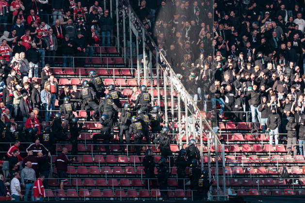 KOELN, GERMANY - OCTOBER 11: Police securing the stands during the Bundesliga match between 1. FC Koeln vs. Borussia Moenchengladbach at Rheinenergie-Stadion on matchday 5 of the 1. Bundesliga on October 11, 2026 in Koeln, Germany. DFL REGULATIONS PROHIBIT ANY USE OF PHOTOGRAPHS AS IMAGE SEQUENCES AND OR QUASI-VIDEO. North Rhine Westphalia Germany Copyright: xSteffiexWunderlx