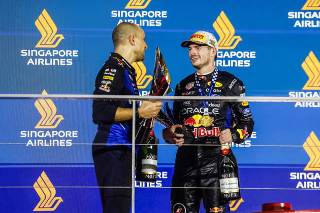 F1 - SINGAPORE GRAND PRIX 2026 VERSTAPPEN Max (nld), Red Bull Racing Ford RB22, LAMBIASE Gianpiero, Head of Race Engineering at Red Bull Racing, portrait, podium during the 2026 Formula 1 Singapore Grand Prix, 17th round of the 2026 Formula One World Championship, WM, Weltmeisterschaft from October 9 to 11, 2026 on the Marina Bay Street Circuit, in Singapore, Singapore - SingaporeSingapore  Copyright: xJulienxDelfossex