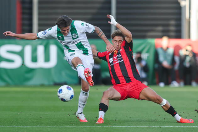 2026-10-11 Excelsior Rotterdam v FC Groningen - Dutch Eredivisie ROTTERDAM, NETHERLANDS - OCTOBER 11: Tika de Jonge of FC Groningen is challenged by Lennard Hartjes of Excelsior Rotterdam during the Dutch Eredivisie match between Excelsior Rotterdam and FC Groningen at Stadion Woudestein on October 11, 2026 in Rotterdam, Netherlands. Rotterdam Stadion Woudestein Netherlands Content not available for redistribution in The Netherlands directly or indirectly through any third parties. Copyright: xHansxvanxderxValkx