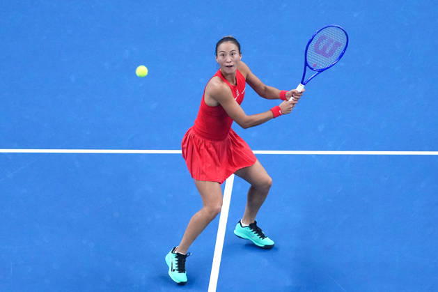 (261011) -- BEIJING, Oct. 11, 2026 -- Zheng Qinwen hits a return during the women s singles final between Zheng Qinwen of China and Mirra Andreeva of Russia at 2026 China Open tennis tournament in Beijing, China, Oct. 11, 2026. ) (SP)CHINA-BEIJING-TENNIS-CHINA OPEN-WOMEN S SINGLES-FINAL (CN) JuxHuanzong 